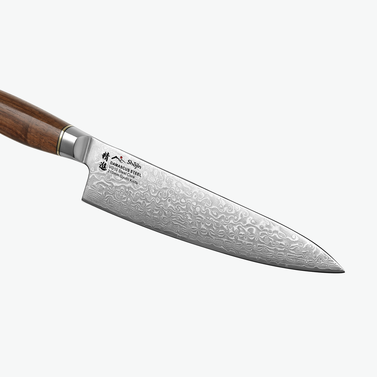 Damastmuster auf der Klinge des Shōjin Kaku Gyuto mit Walnussgriff, Nahaufnahme