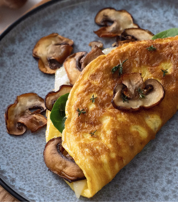 Omelett mit Pilzen, Spinat und Käse